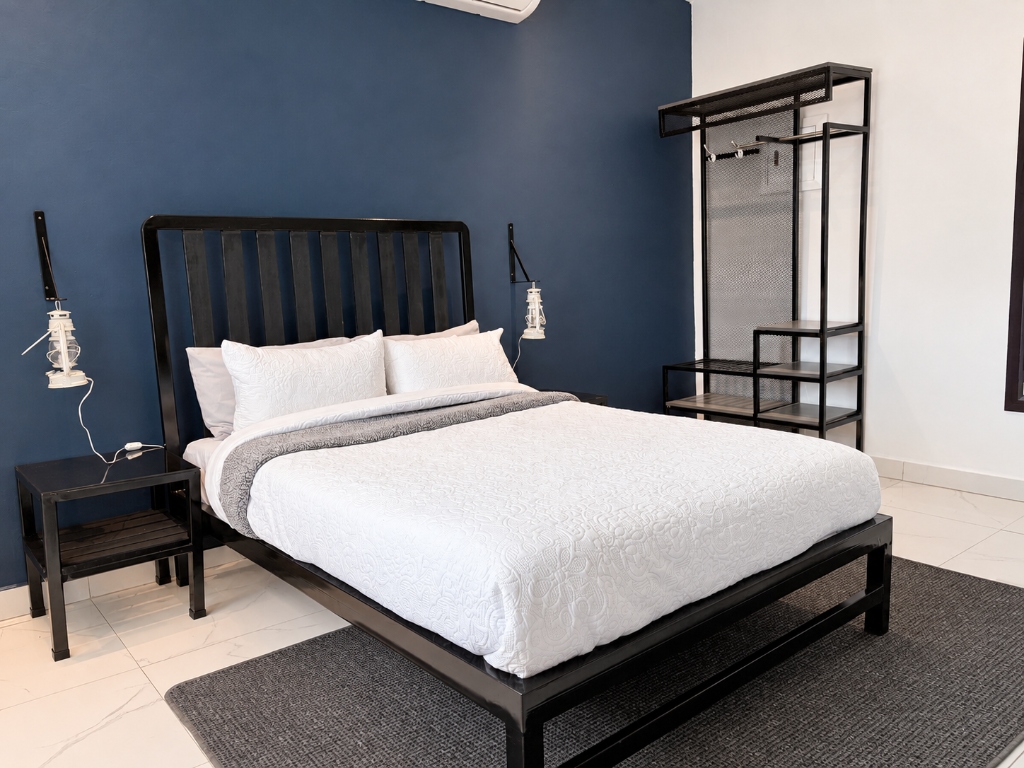 Deluxe Double Room with blue accent wall